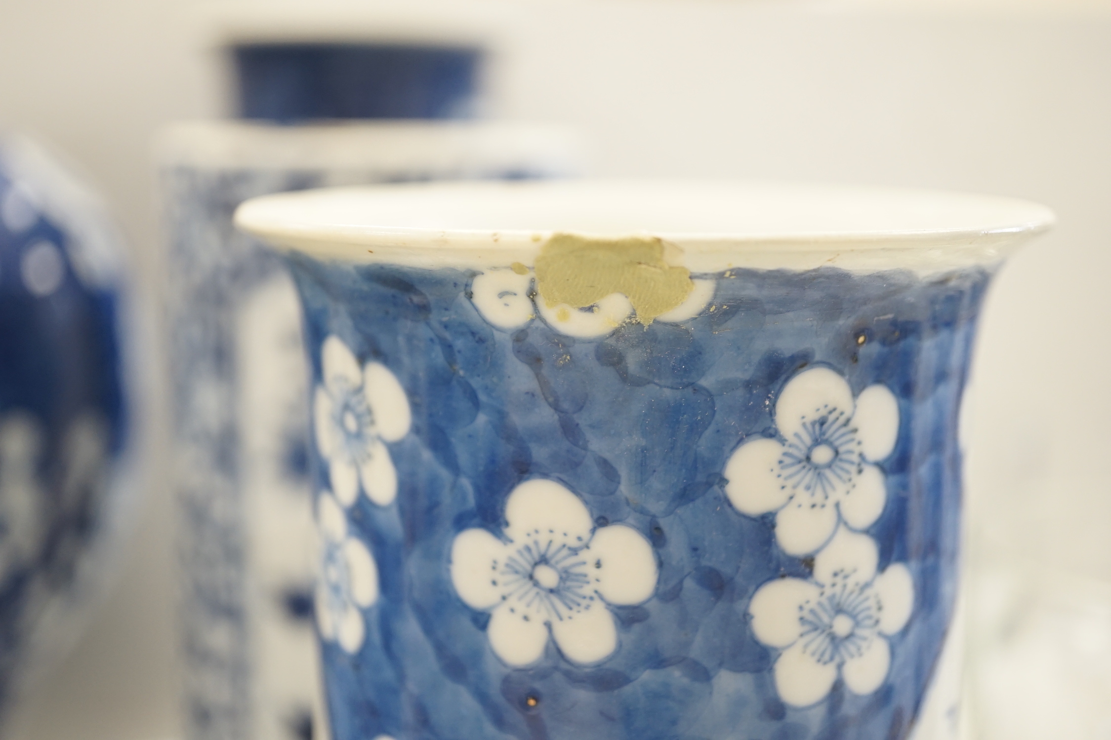 A Chinese blue and white Buddhist lion moon flask, a baluster vase, three sleeve vases and two others, 19th century, tallest 33cms (a.f.)